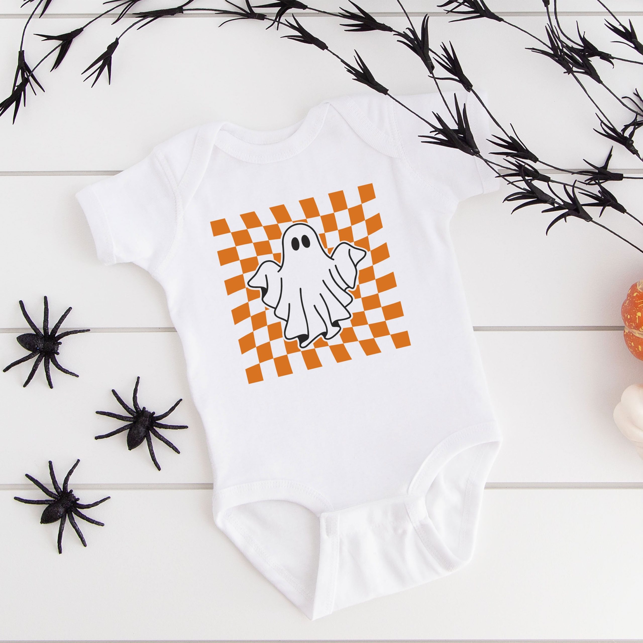 The Juniper Shop Baby Checkered Ghost Graphic Short Sleeve Onesie